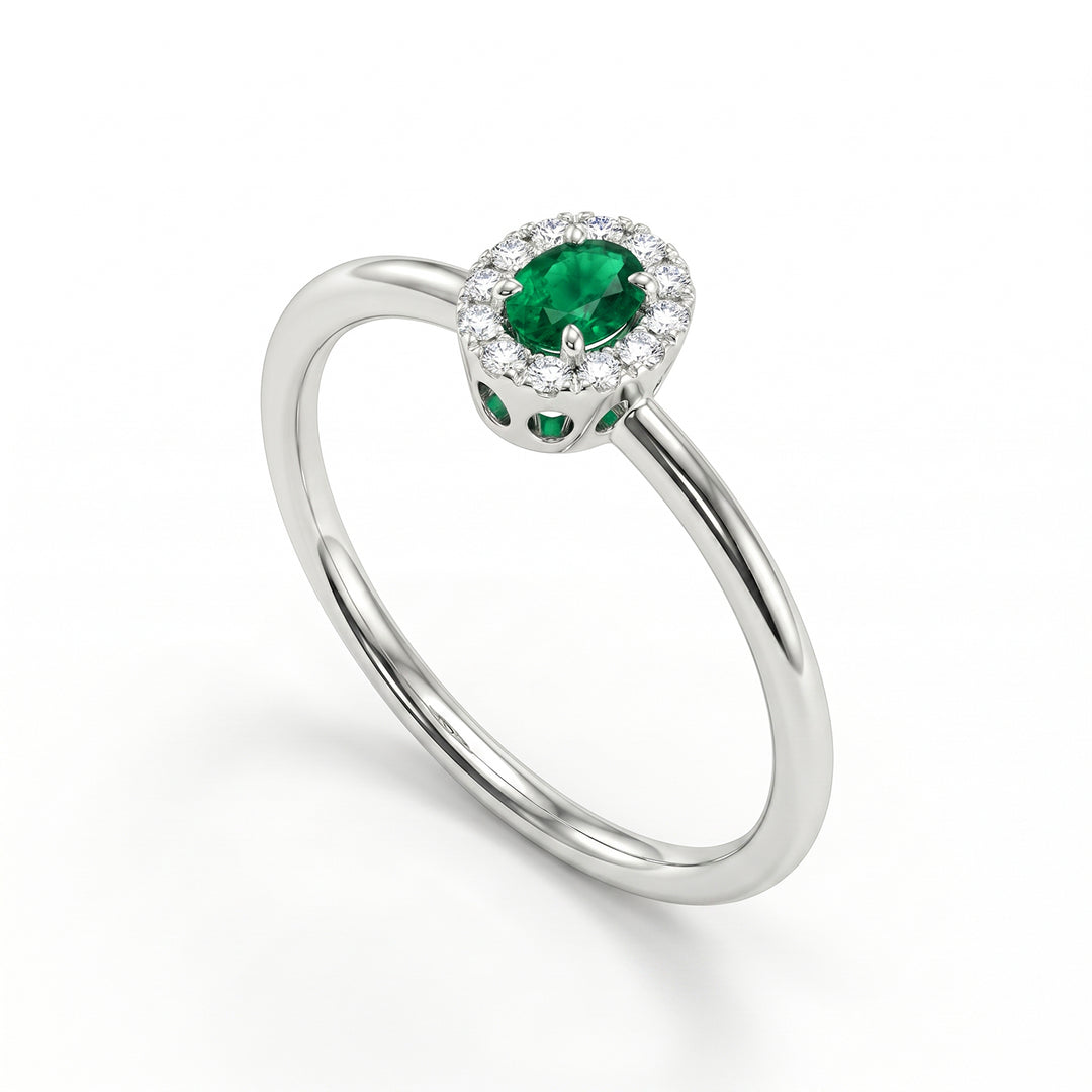 Mikiko an 18k oval emerald 4x3 with diamond outline and smooth shank MA5233O4SMN