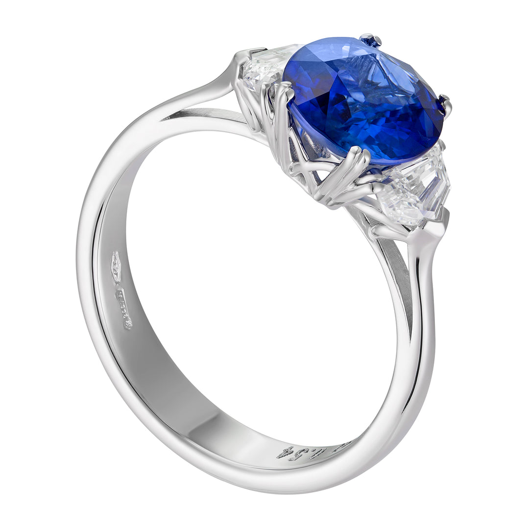 Golay ring with oval sapphire ct. 2.02 and trapezoid APU260DIZB-18144110036