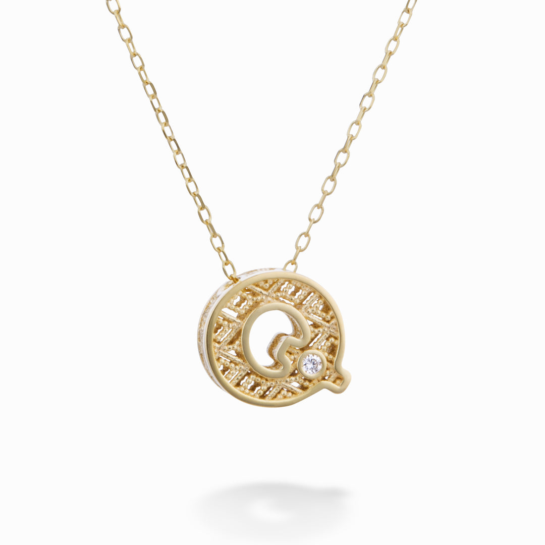 Nihama cl 18k letter q yellow gold diam. ct.0,01 NDLETQO1