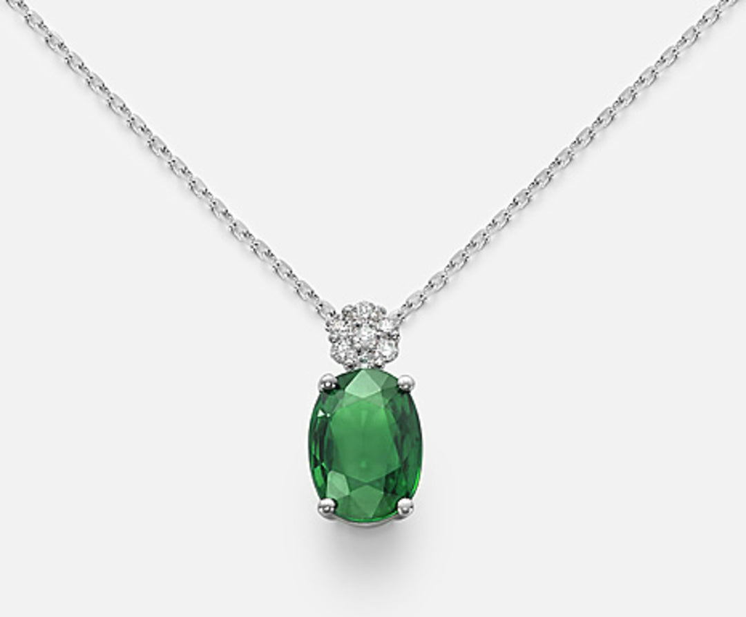 Mikiko cl 18k oval emerald 7x5 ct.0,60 diam. ct.0.045 MD5025O4BE