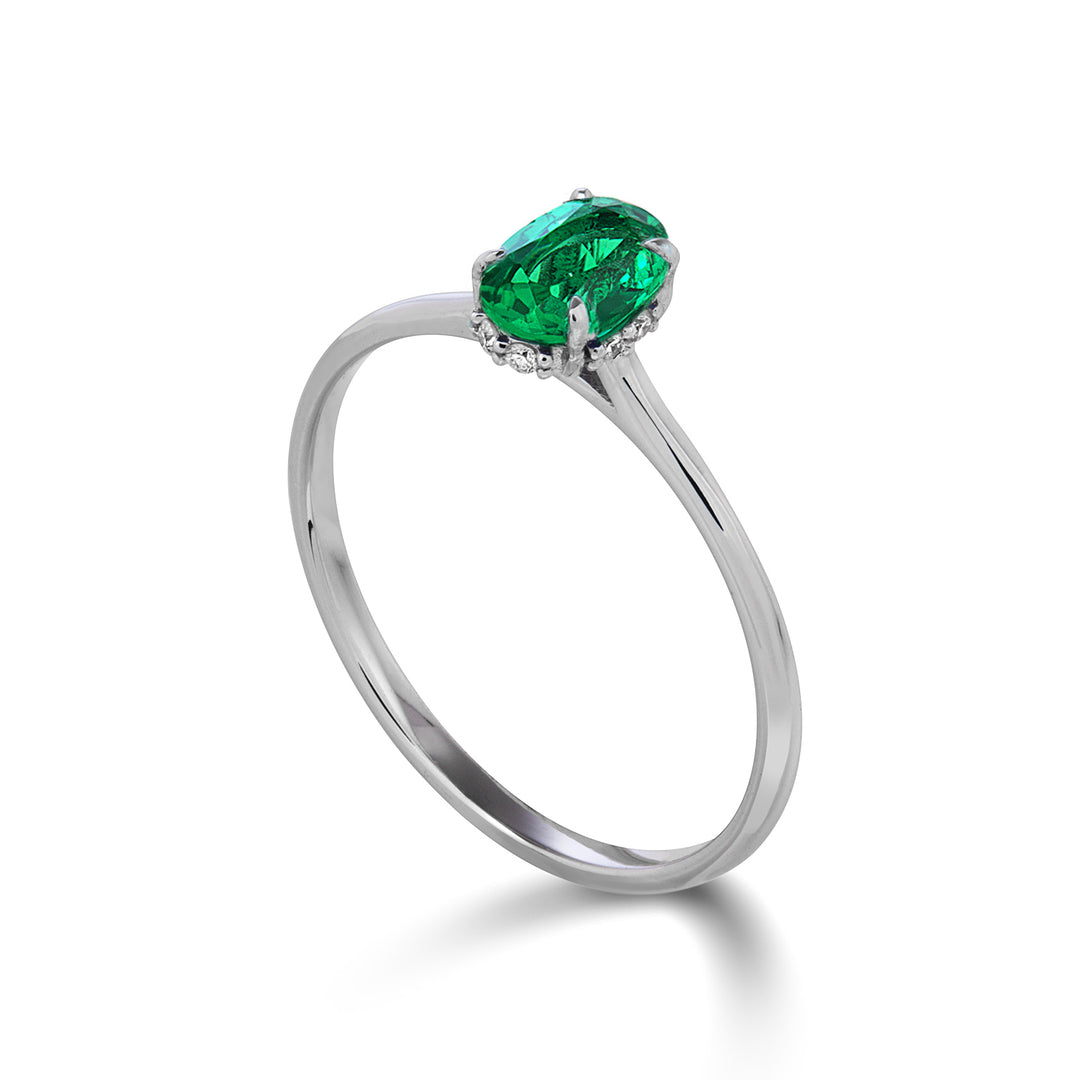 Mikiko an 18k oval emerald 5x4 set with diamonds MA5218O4BE