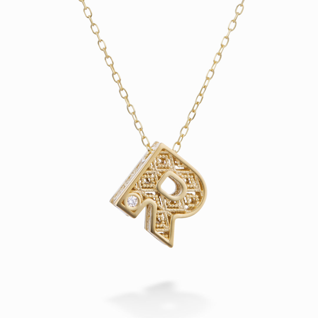 Mikiko cl 18k letter r yellow gold diam. ct.0,01 MDLETRO1