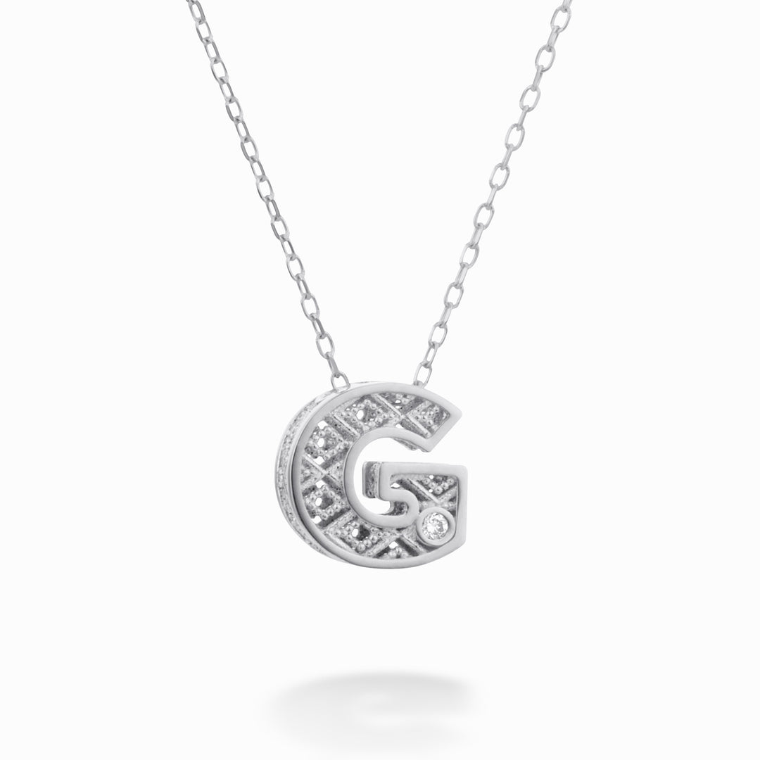 Mikiko cl 18k letter g white gold diam. ct.0,01 MDLETGO4