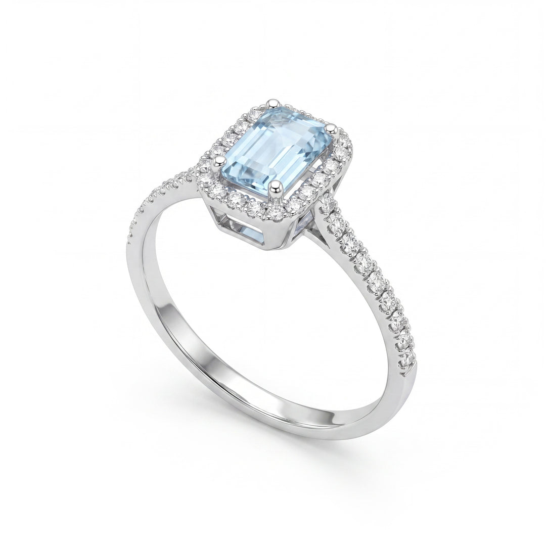 Nihama an 18k aquamarine oct. 6x4 with diamond outline and recessed shank NA5232O4AM