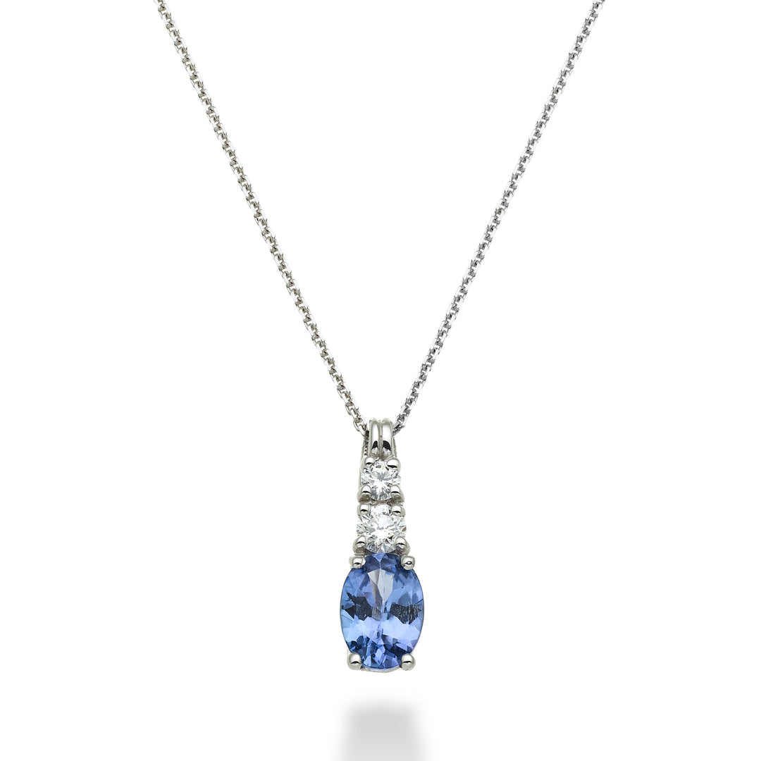 Nihama cl 18k tanzanite n. oval 7x5 ct.0.60 dia ct.0.15 ND5056O4TZN