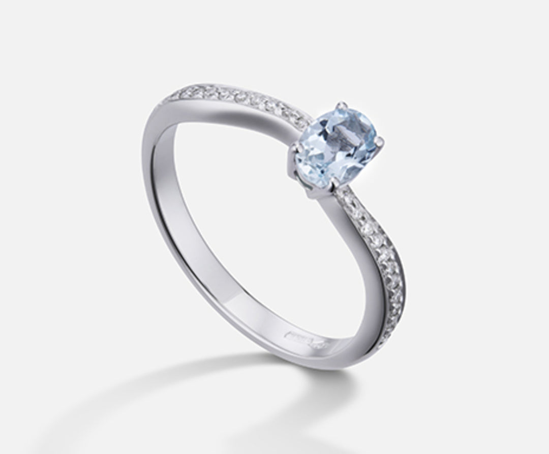 Nihama an 18k oval aquamarine 6x4 ct.0.30 diam. 0.10 ct NA5108O4AM