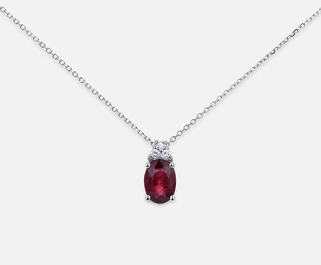 Nihama cl 18k ruby ​​n. oval 7x5 ct.0.85 dia ct.0.045 ND5055O4RBN085
