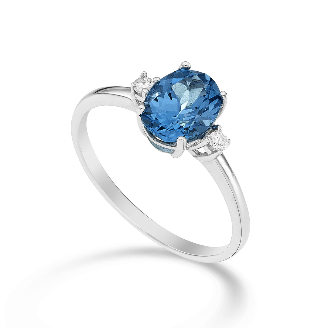 Nihama an 18k oval London blue topaz 8x6 ct.1,40 diam. 0.05 ct NA5074O4TPBL