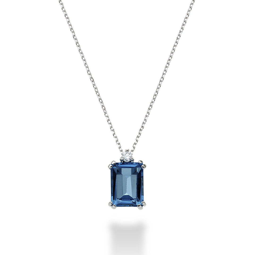 Nihama cl 18k octagonal London blue topaz 8x6 ct.2.65 diam. ct.0,03 NPCL090DITPBL3O4