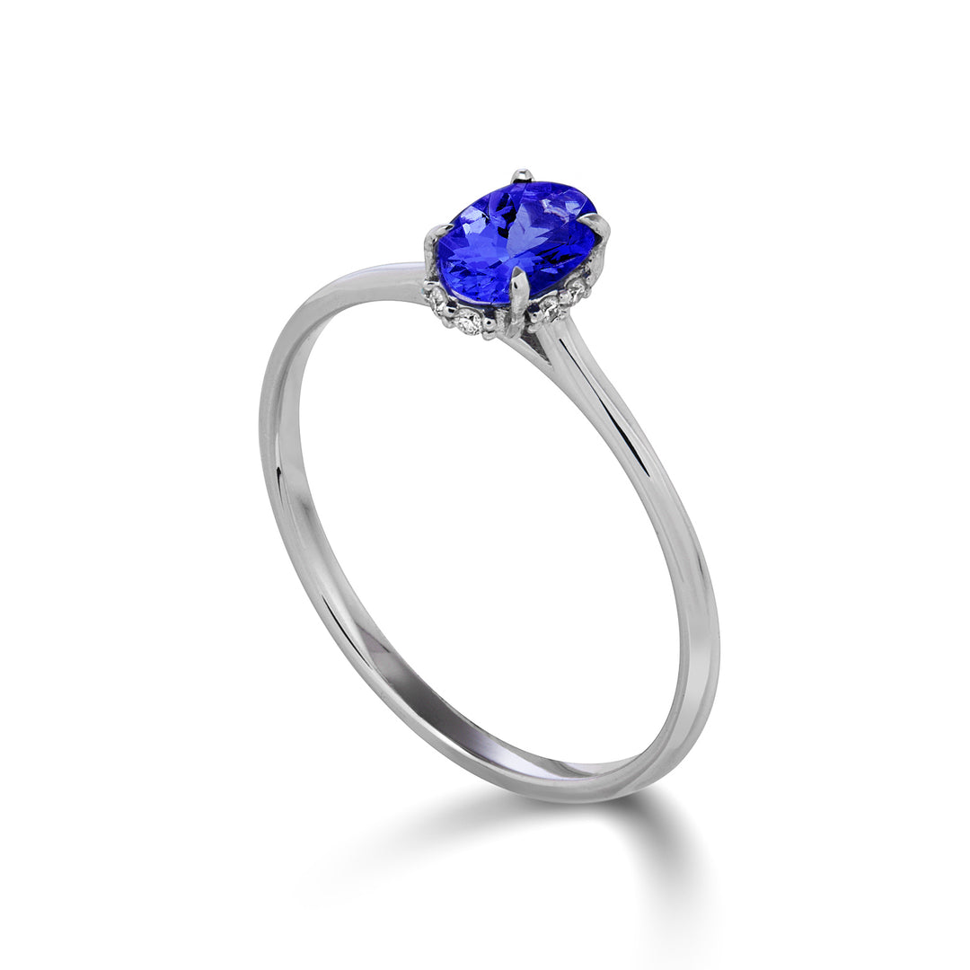 Mikiko an 18k tanzanite oval 6x4 set with diamonds MA5219O4TZN