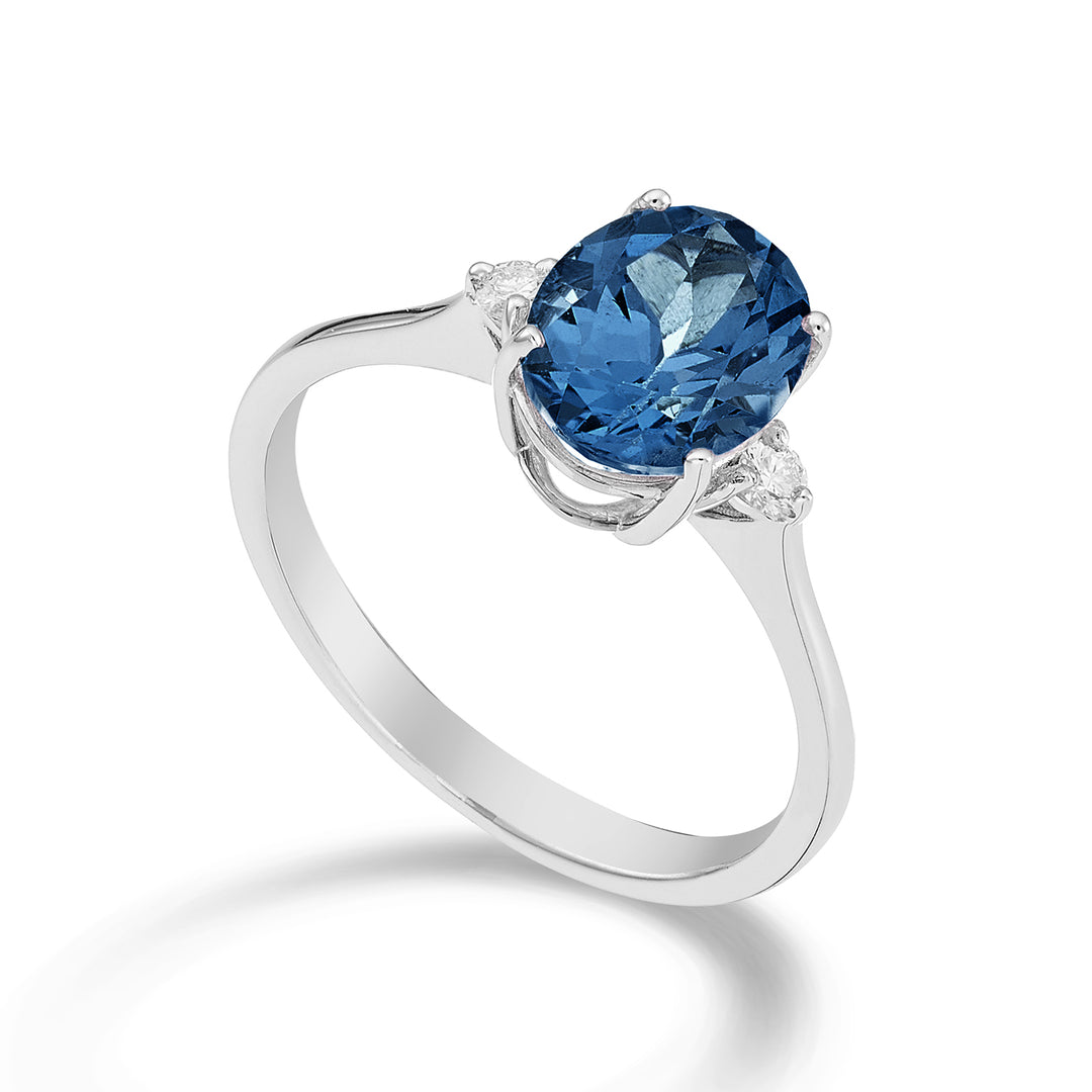 Nihama an 18k oval London blue topaz 7x9 ct.2.00 diam. 0.08 ct NA5143O4TPBL