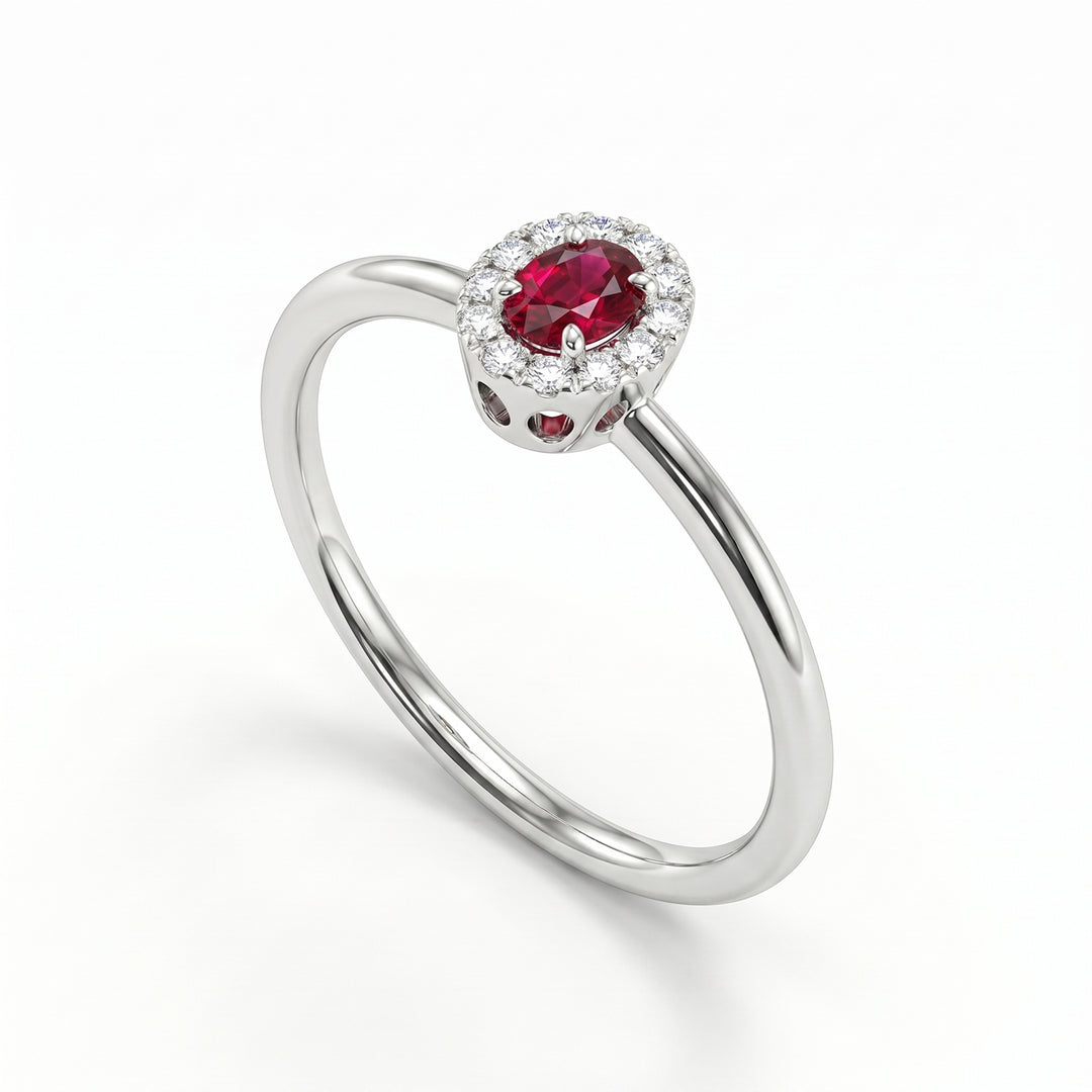 Nihama an 18k 4x3 oval ruby with diamond outline and smooth shank NA5233O4RBN