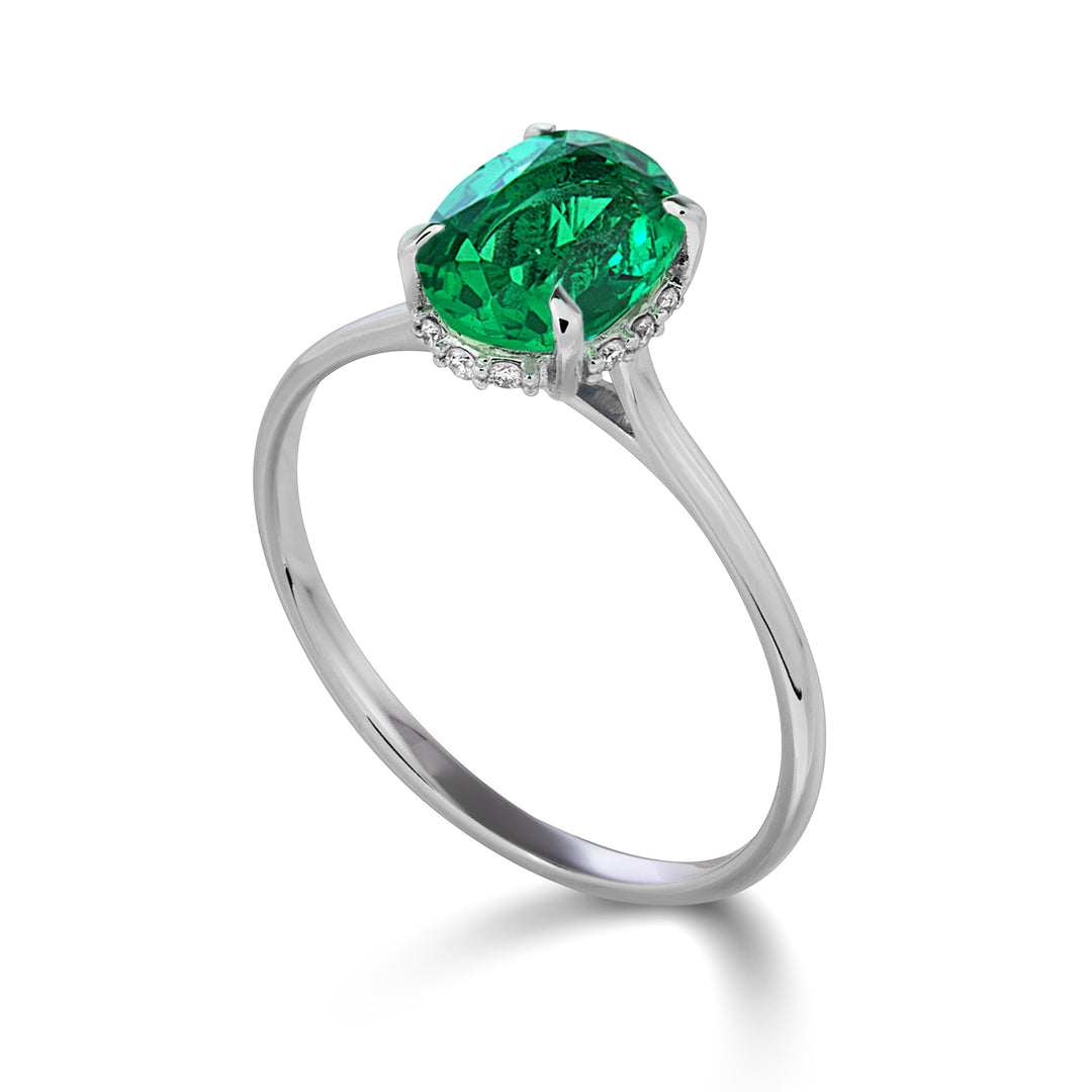 Nihama an 18k oval emerald 8x6 set with diamonds NA5220O4BE