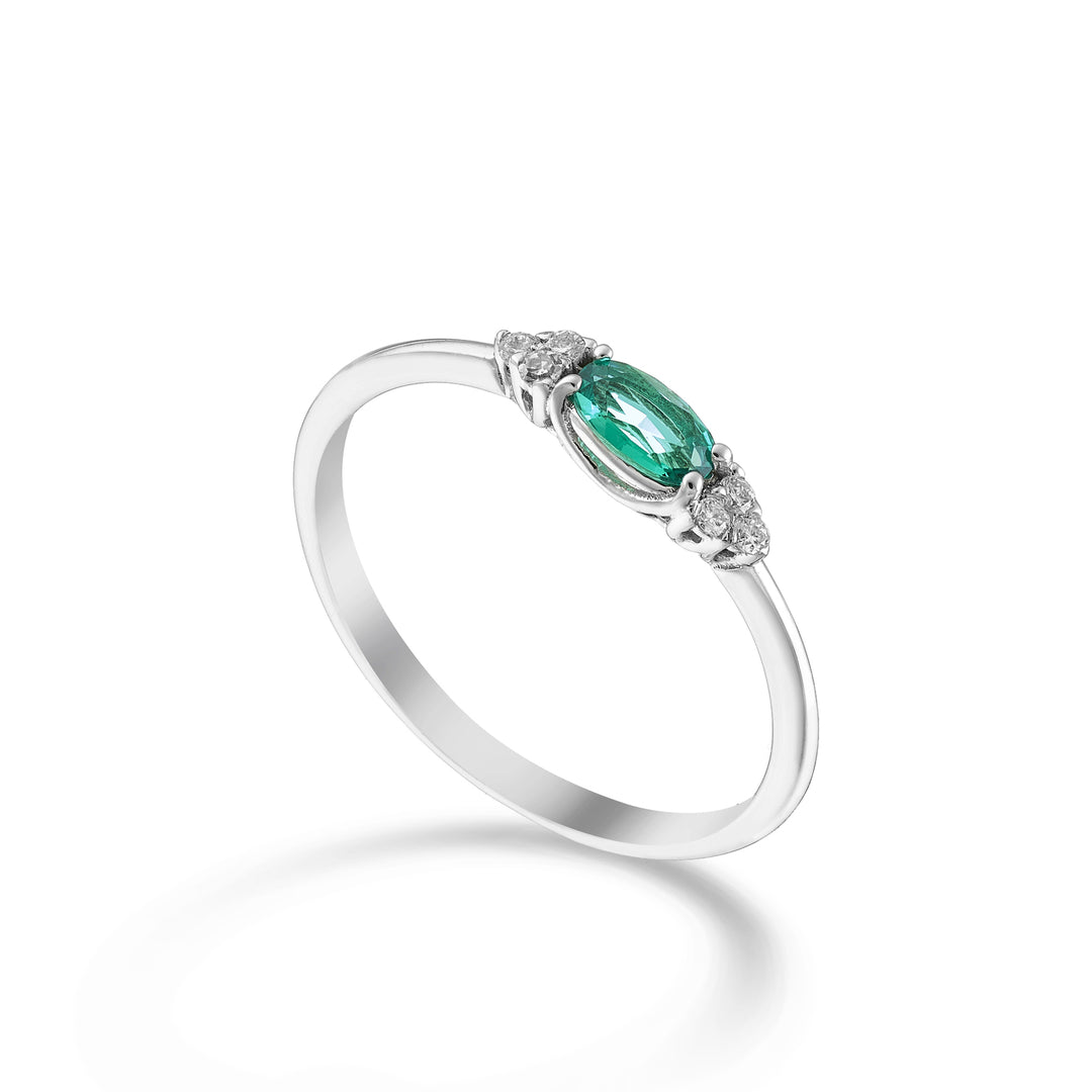 Mikiko an 18k oval emerald 5x3 arranged lengthways and side diamonds MA5212O4BE