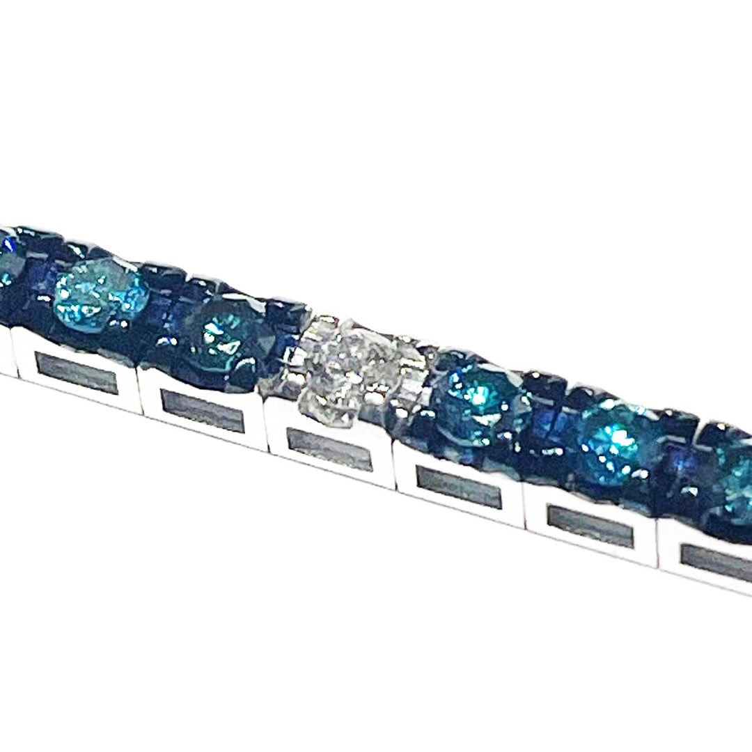 Sidelobe tennis bracelet 18kt white gold blue diamonds M 5188-10-1-BB